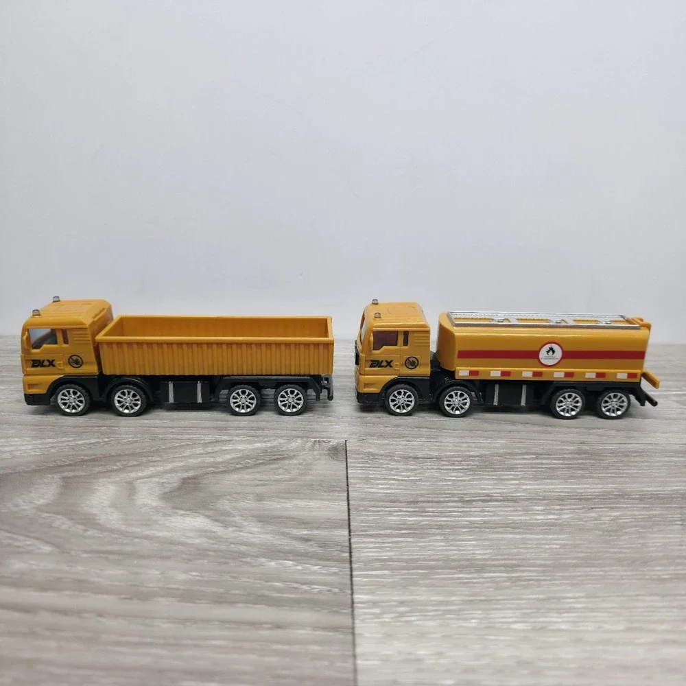 DLX Builder equipment/trucks lot - 2 Hauling Trucks
